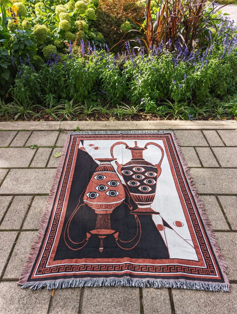 Eyes of Antiquity Woven Blanket