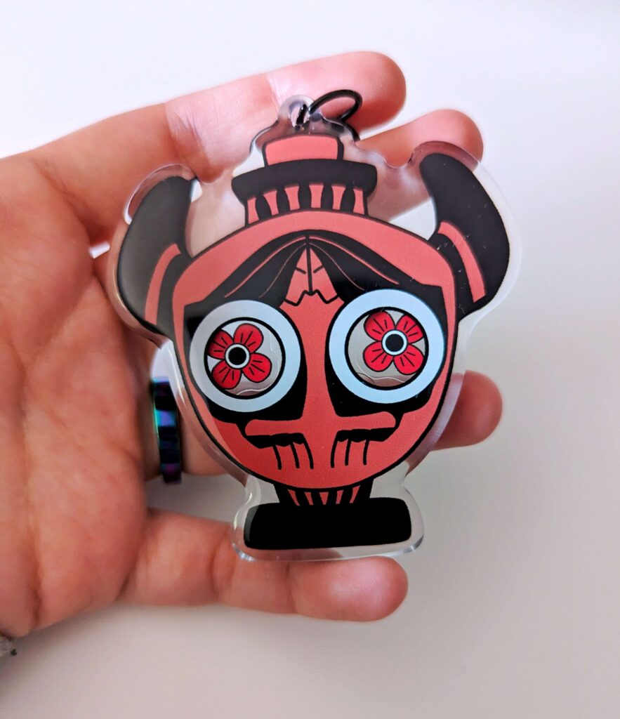 Sleepy Eyes Amphora Shaker Charm